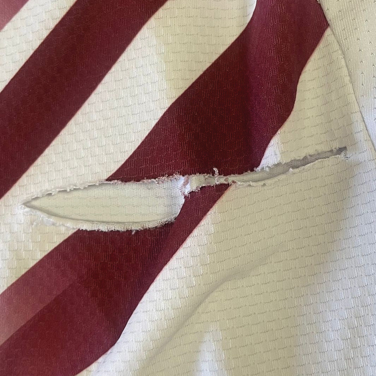 Evans Signed Match Worn Shirt w/ Tear